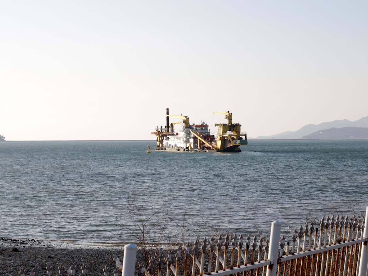 Industrial dredging vessel at work on open water